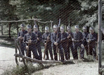 A group of Swiss border guards behind a fence between Switzerland and France, Department Haut-Rhin, Alsace, France, June 19, 1917